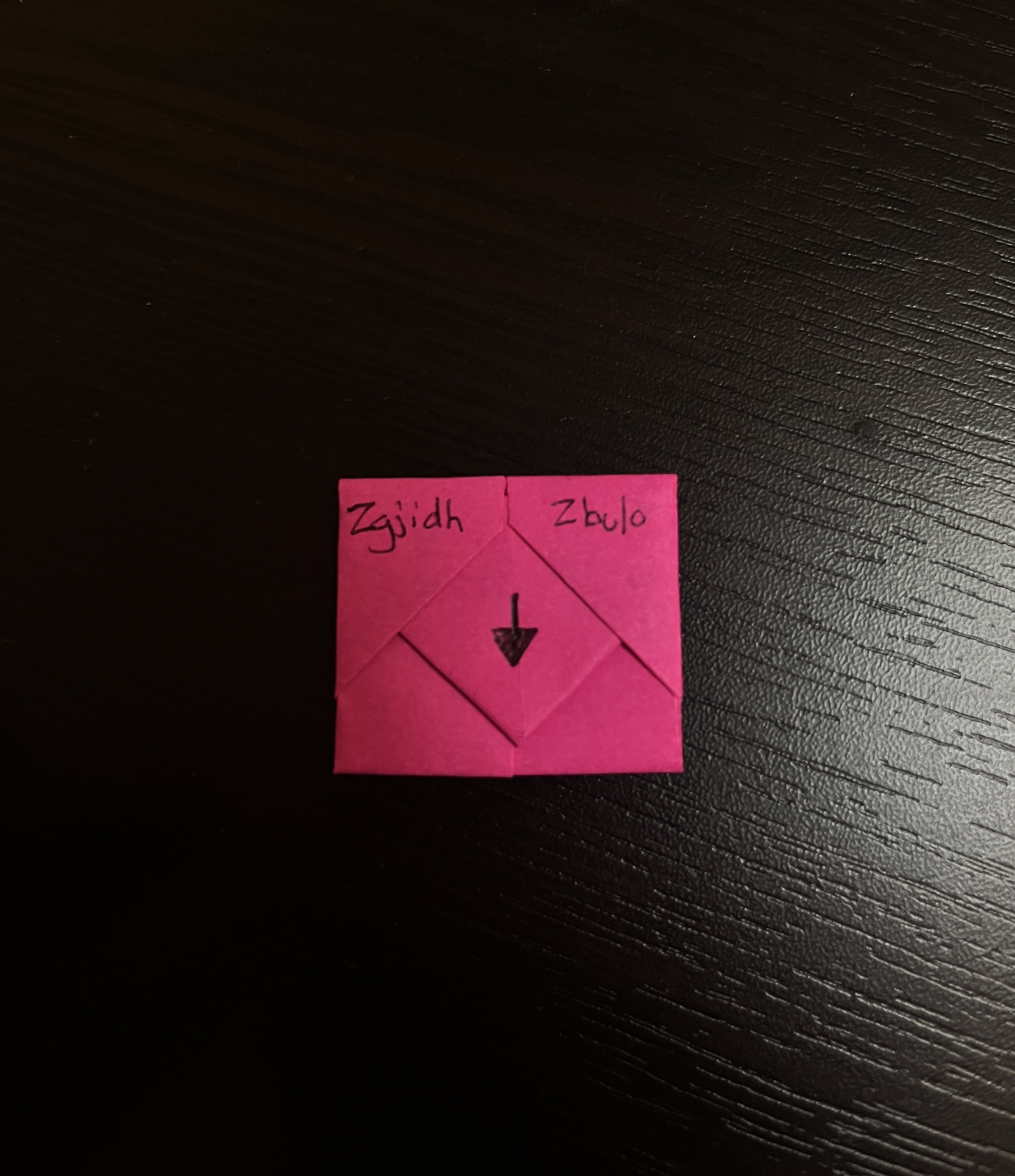 Handwritten notes folded and ready to be left